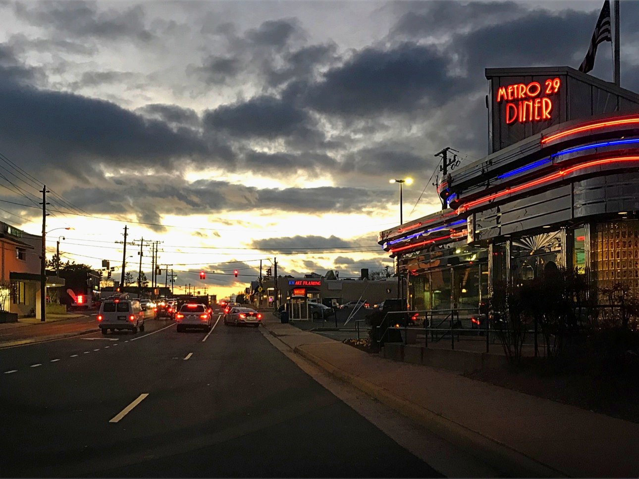 The Metro 29 Diner at dusk under a storm sky